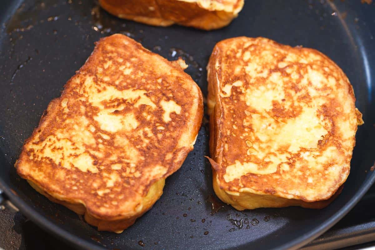 Cooking French Toast in a pan with butter