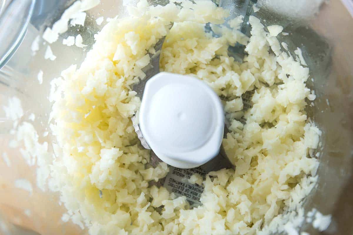 Potatoes chopped small in a food processor