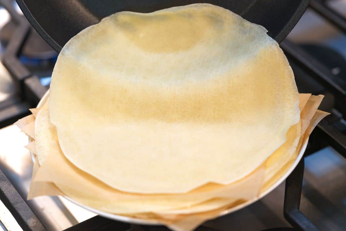 Making homemade Italian Crespelle for manicotti