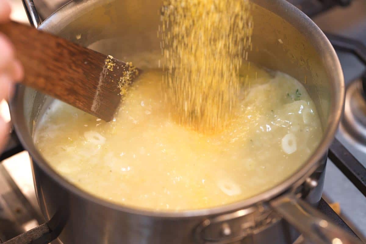 Stirring polenta into broth