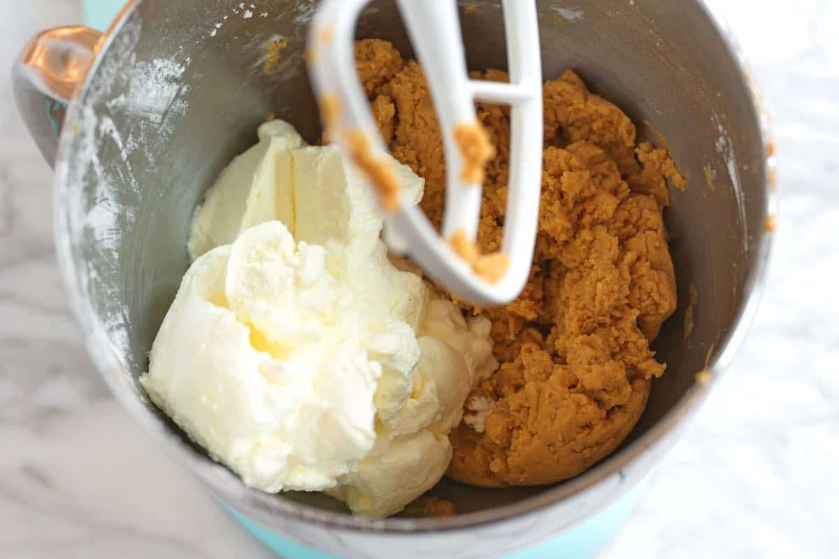 Mixing whipped cream into the peanut butter filling