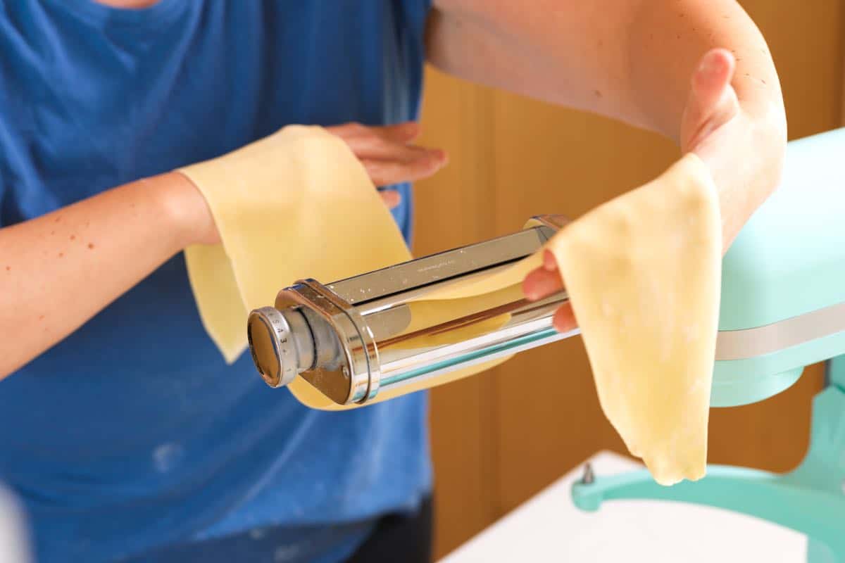 Rolling the homemade pasta dough on setting #6