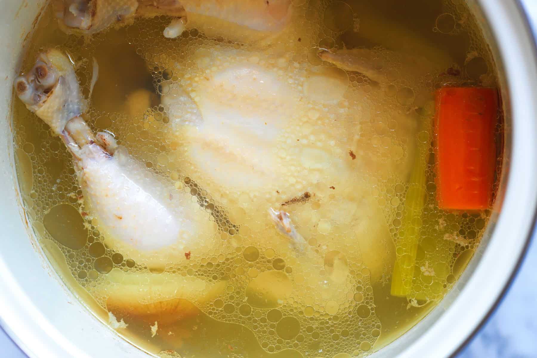 Making chicken broth for chicken and dumplings from scratch