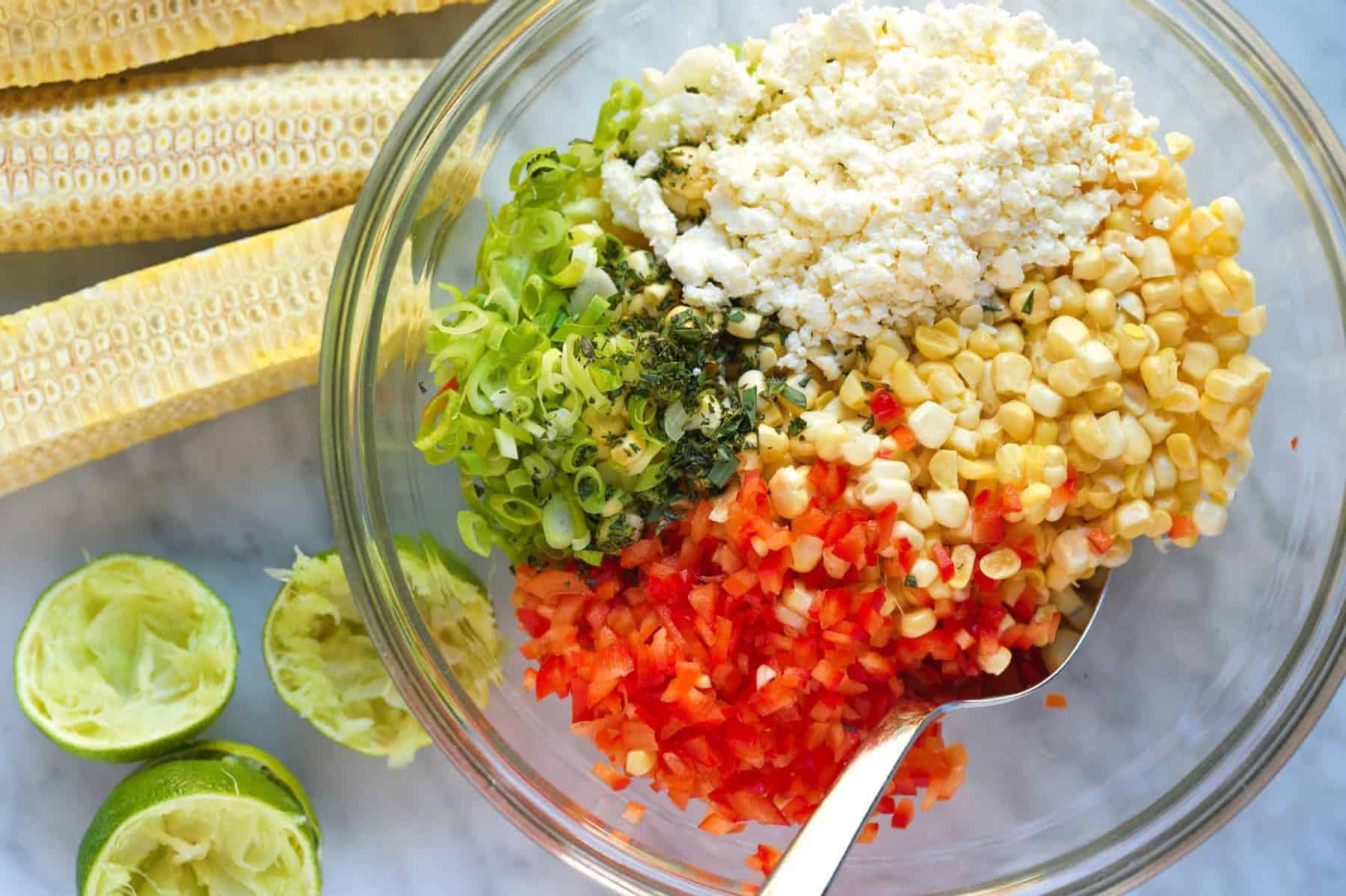Corn salad ingredients in a bowl