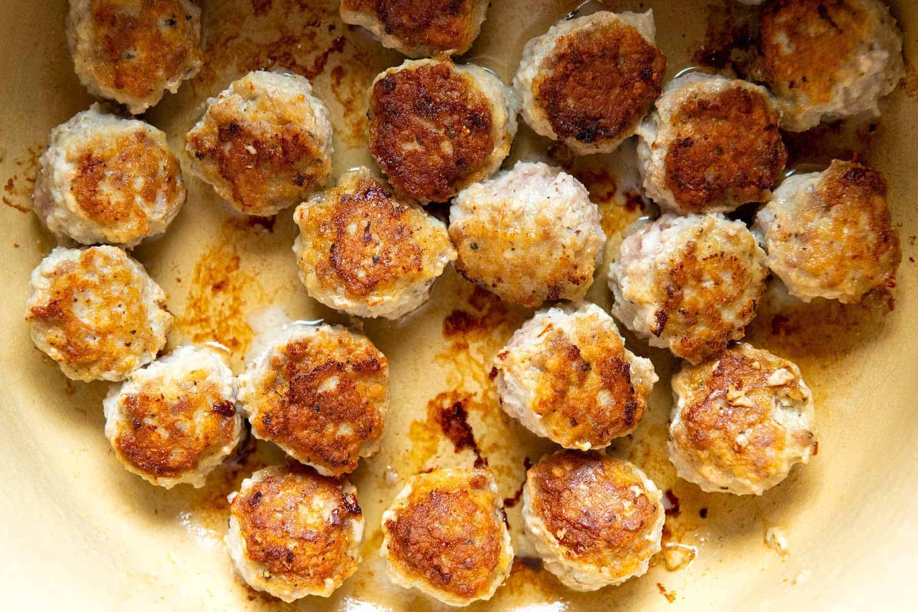 Browning meatballs for Italian wedding soup