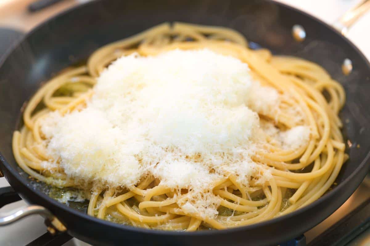 Showing how finely you need to grate pecorino cheese for cacio e pepe