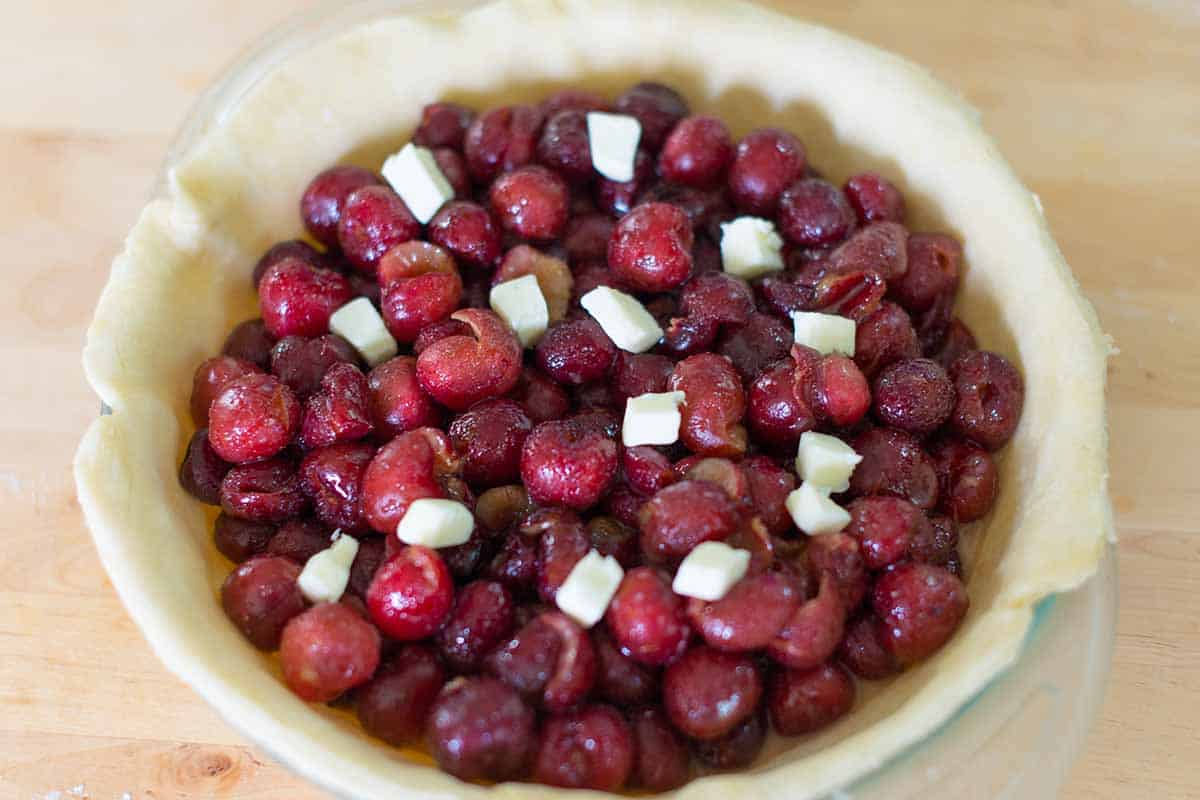 Cherry pie filling in a pie crust.