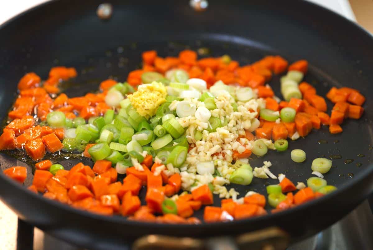 Cooking vegetables for fried rice in pan