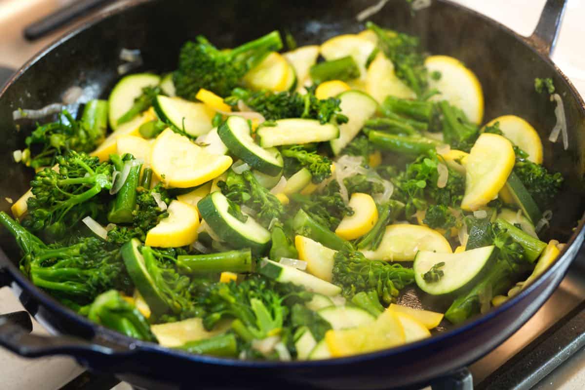 Cooking vegetables for pasta primavera