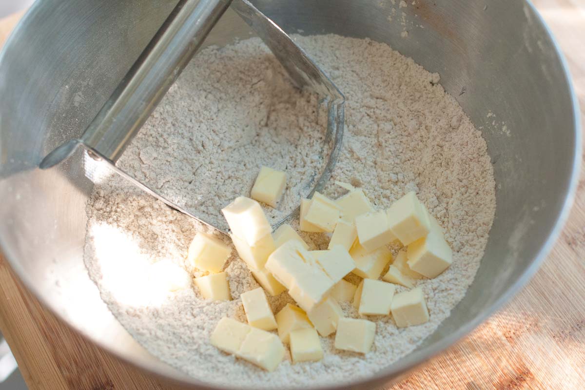 Mixing in cold butter. 