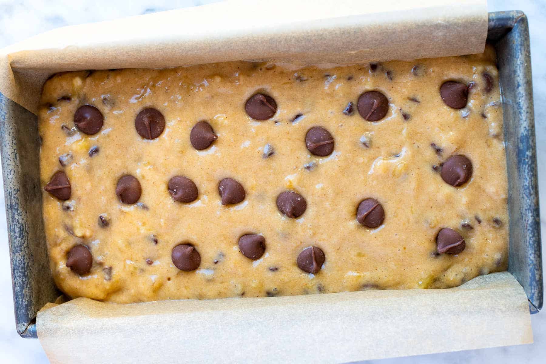 Our chocolate chip banana bread batter in the loaf pan.
