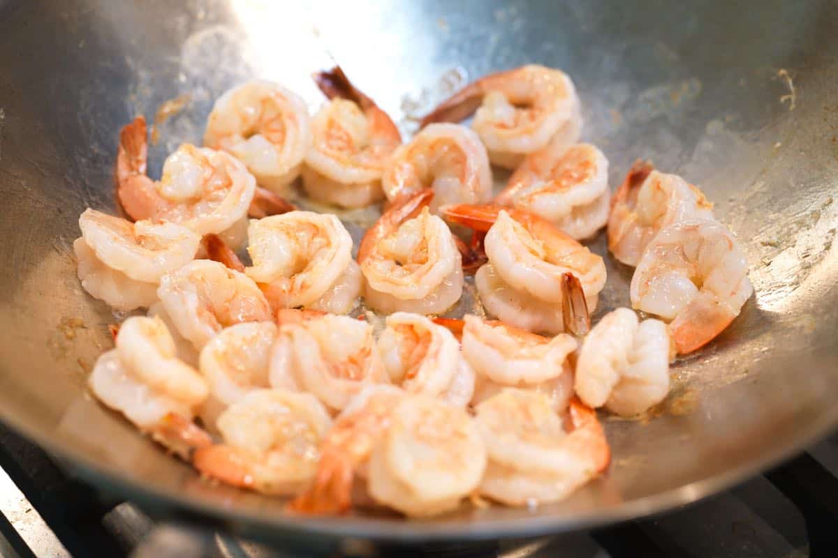 Cooking shrimp in a wok for shrimp stir fry