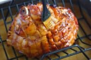 Brushing Brown Sugar and Honey Ham Glaze onto Baked Ham