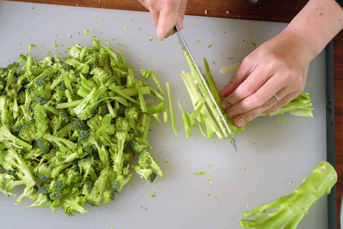 Cutting broccoli for coleslaw