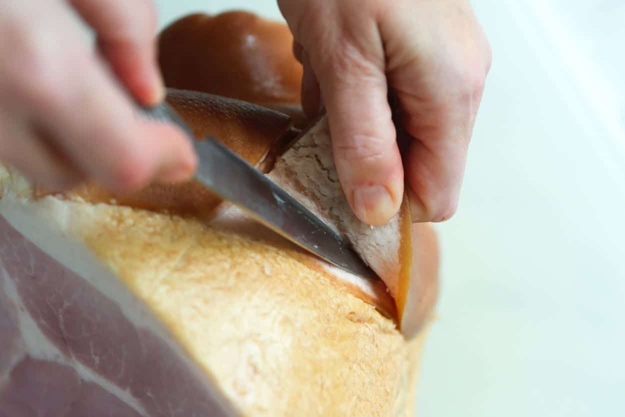 Removing the rind from ham