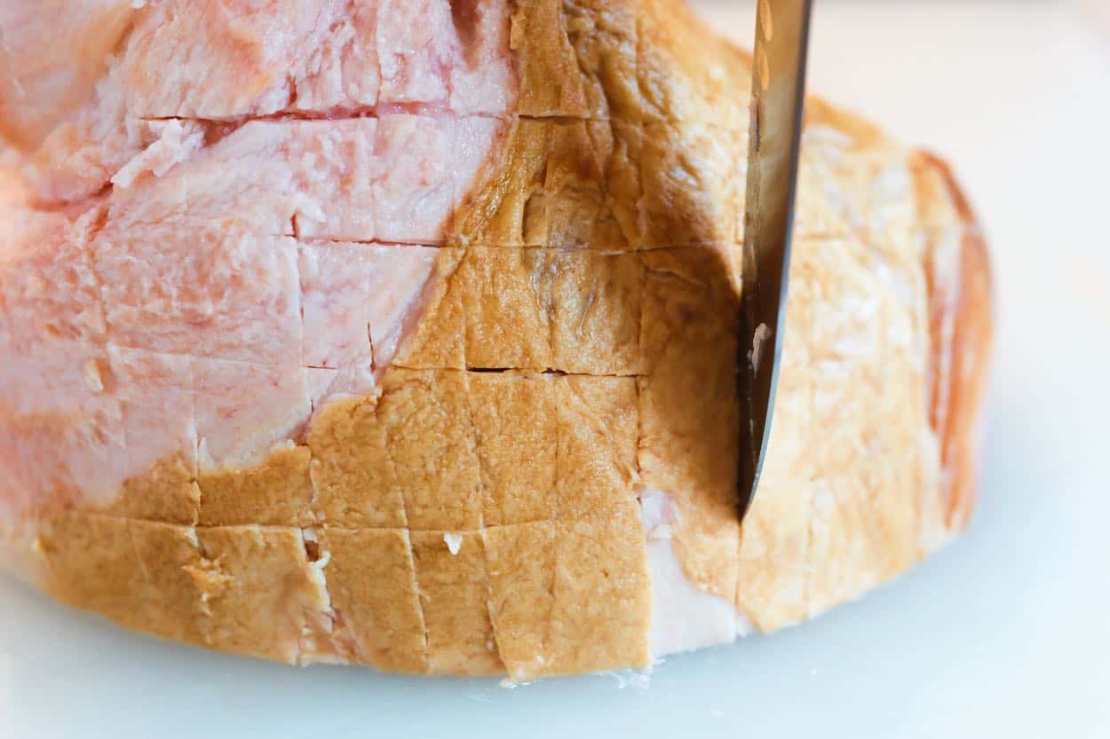 Scoring a crosshatch pattern in ham before baking