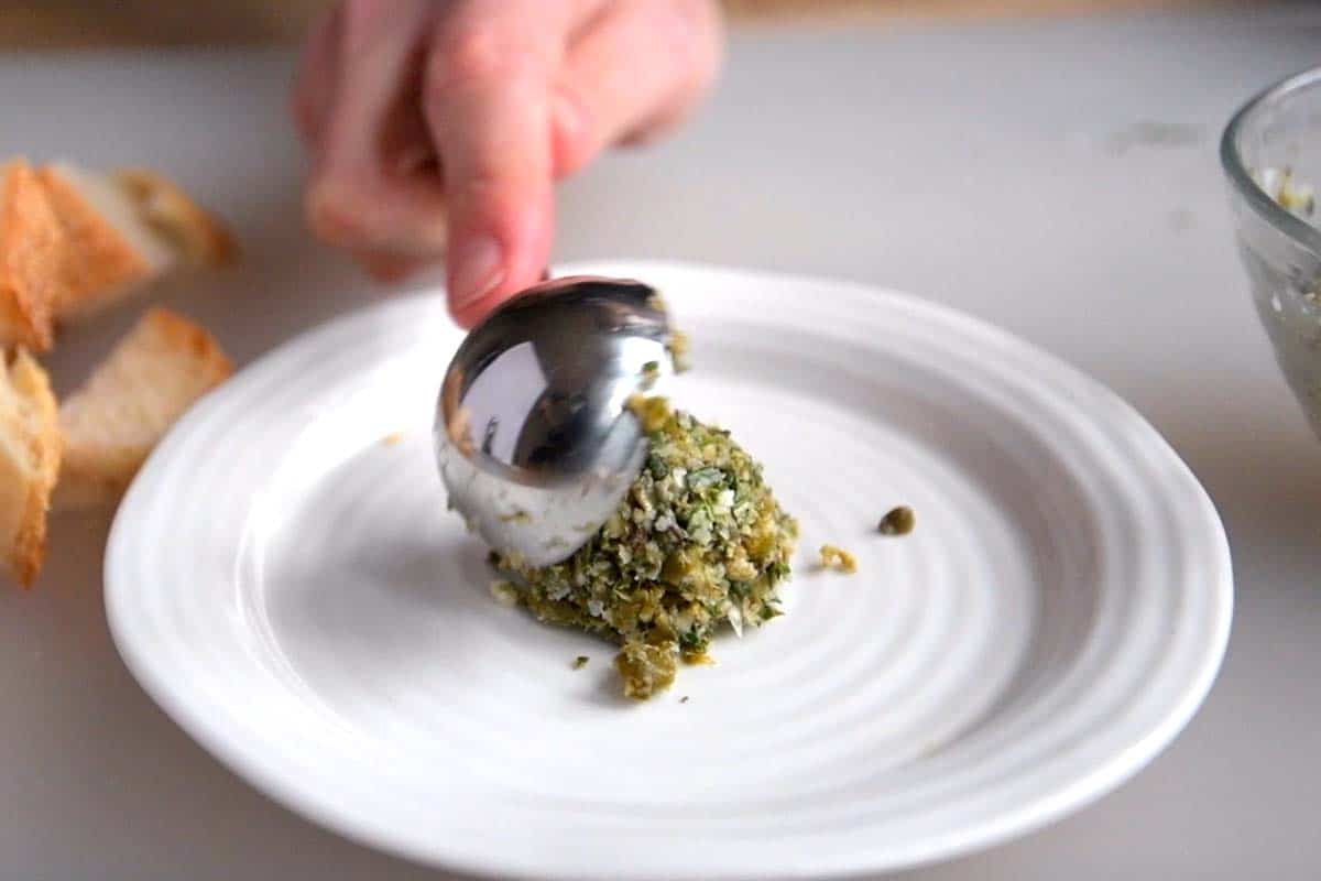 Serving olive oil dip on a plate