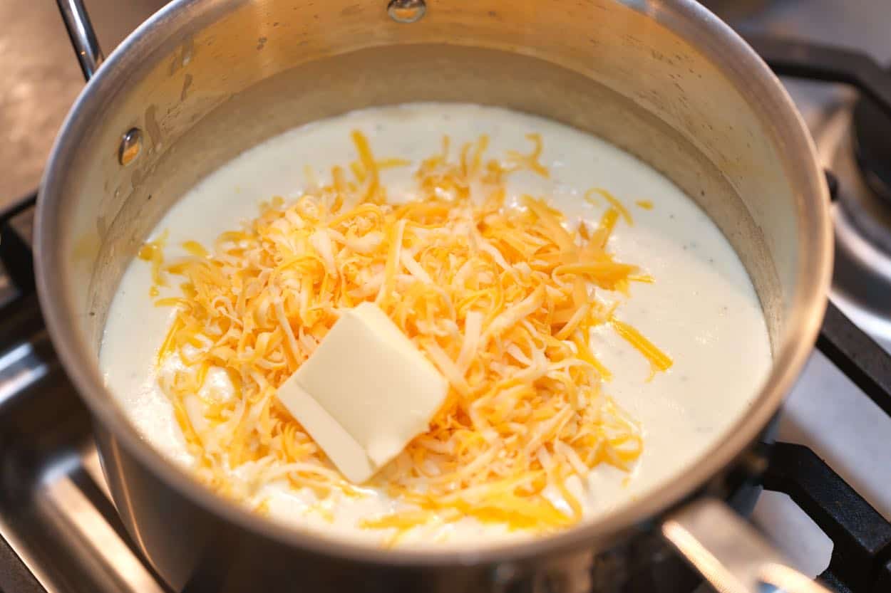 Making the cheese sauce for potatoes au gratin