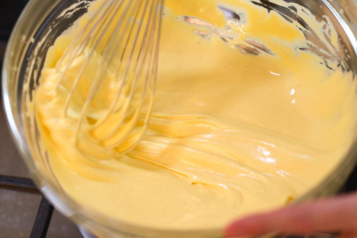 Zabaglione almost ready - looks thick, pale yellow, and frothy
