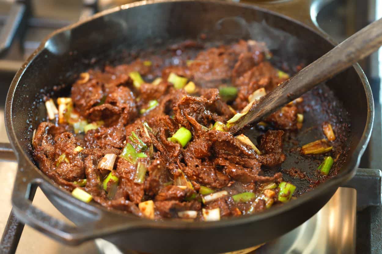 Cooking beef bulgogi in a skillet