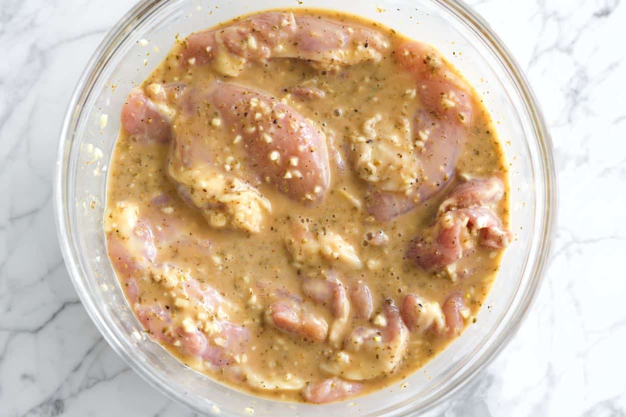 Marinating chicken thighs in a honey mustard marinade