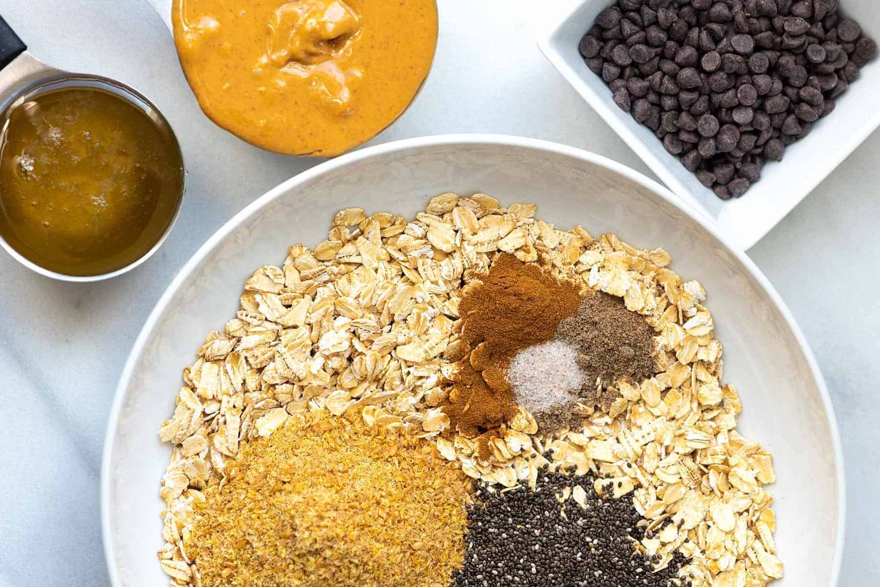 Energy Balls ingredients: oats, peanut butter, honey, flaxseed meal, chia seeds, chocolate chips