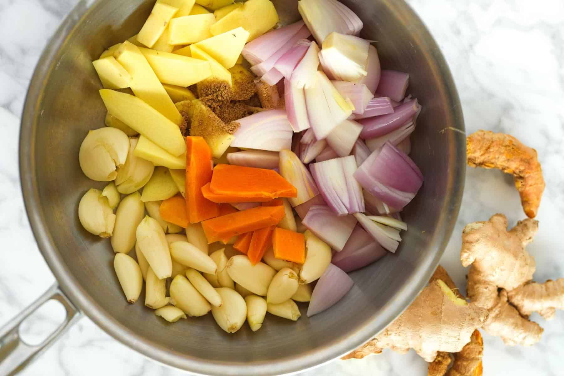 Yellow Curry Paste Ingredients in a Saucepan