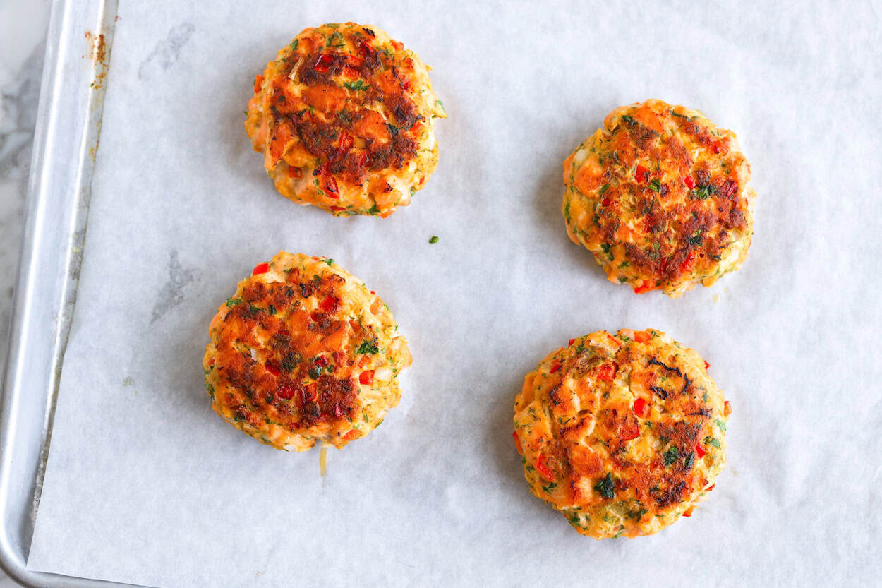 Finished, baked salmon burgers ready for serving