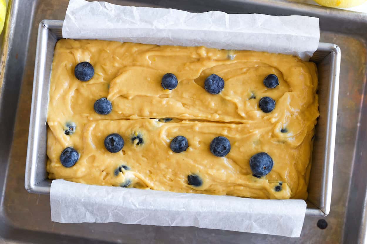 Lemon Blueberry Bread in loaf pan ready to bake