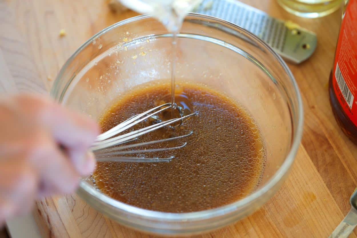 Making Chinese Chicken Salad Dressing in a small bowl