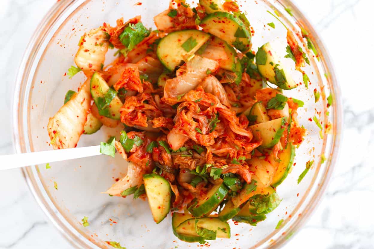 kimchi salad ingredients in a bowl ready for pork burgers
