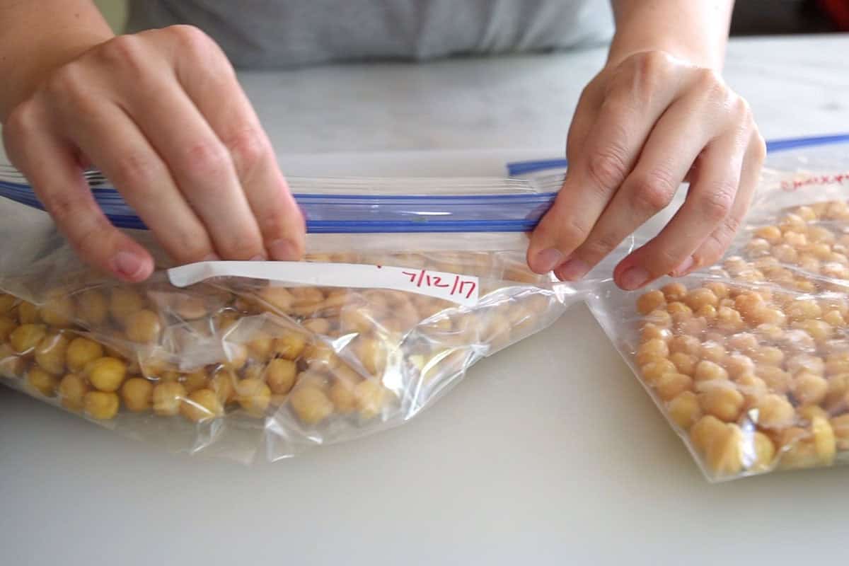 Transferring frozen cooked chickpeas to freezer bags